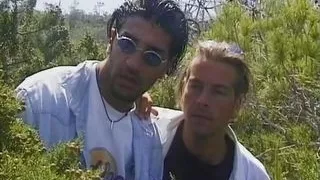 Skillful German lady handling two hard cocks outdoors