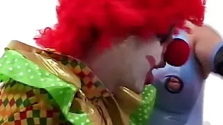 Gorgeous Blonde Jodie Moore Lets a Creepy Clown Pound Her Asshole Before Tasting His Cum