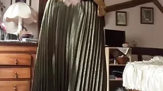 In bourgeois attire with a long skirt