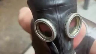 Cumshot on gas mask