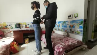 Tied Up Chinese Girl Playing Cellphone