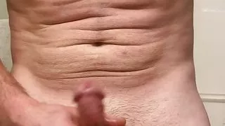 Male solo masturbation in the bathroom
