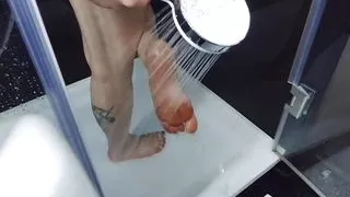 Beverly Peach pampers her feet in the hotel room