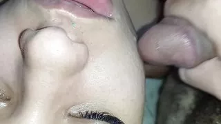smearing the bitch's pretty face with my horny cum