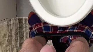 Tom Rivers Empties His Bladder and Fills a Condom