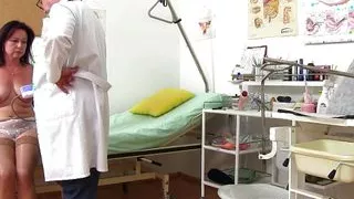 Mature Gyno- cam footage of mature woman gyno speculum exam + vaginal irrigation