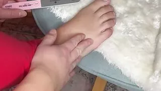 Horny feet are painted red (toenails)