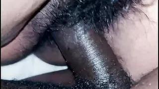 Hairy wet pussy enjoying a black dick