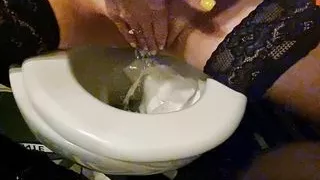 Sexy Milf pisses in club. Toilet