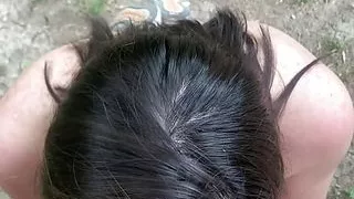 Nebraska coed sucks a stranger's cock on a public trail in the woods