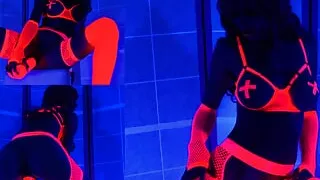 Solo pee masturbation under black light in neon lingerie