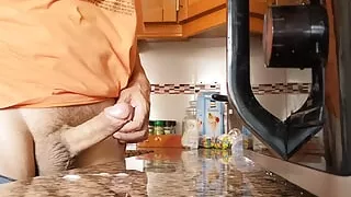 Horny guy keeps jerking off and cums all over in his kitchen