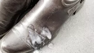 Here I am squirting a big load of cum onto my wife's hot high brown leather boots in the bathroom for the first time