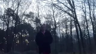 Dressed with a fuchsia skirt in a forest