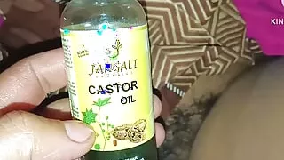 Penis and vagina massaged with castor oil and fucked