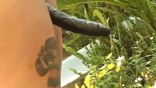 Two Tattooed Ebony Babes Fuck with a Black Strap on and a Big Double Ended Dildo