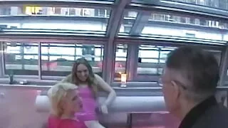 Two racy lesbian bitches show off and lick each other on a boat in Paris