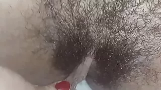 Indian Amateur Aunty is Rubbing her Hairy Pussy