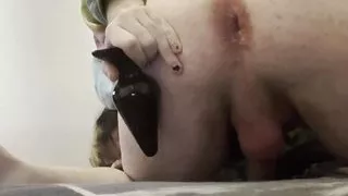 Caged Slave Goes From Large Plug To Anal Training