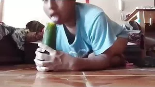 Sucking huge cucumber