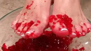 A Sexy Brunette Babe Dips Her Feet in a Bowl and Lets a Guy Lick