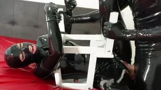TouchedFetish - Latex & BDSM Couple in Rubber Catsuits - Submissive slave is tied up, gagged in Bondage, spanked, whipped & padd