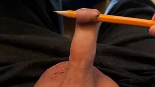 Play with the foreskin of my little cock and a pencil