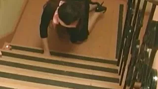 A Stunning Lady in a Latex Dress Satisfies Another Lady with Her Sex Toy