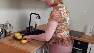 Horny mature slut Cindy sucking my cock wearing pantyhose in kitchen