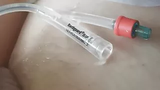 Playing with my catheter and cock