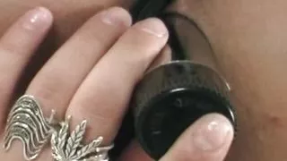 Dark haired French babe stuffing dildoes in her moist holes