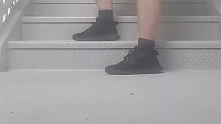 In the stairwell relieving myself