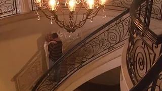 Busty blonde MILF fucking with a friend on the stairs