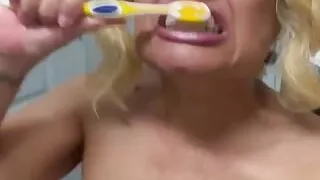 Sexy Mature Brushing Her Teeth