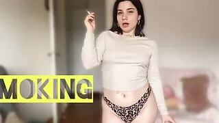 Sexy tattooed model smokes Marlboro red