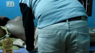 Tamil housewife doing massage at home