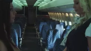 Two Naughty Flight Attendants Show Their Pussies to Each Other and Bang with a Dildo