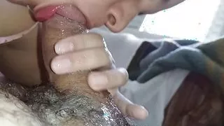 CLOSE-UP of those big plump wet lips touching the bottom of a hard cock