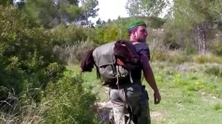 On the Mountain a Redhead Slut Is Riding a Soldier in a Cowgirl Pose