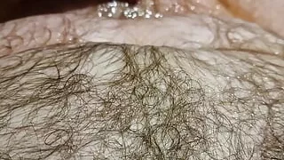 A nice hot bath playing with my ball sack and letting the piss flow all over my hairy body