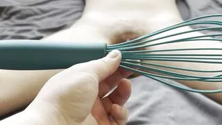 Brunette in bondage fucked by a kitchen whisk