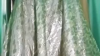 Indian Gay Crossdresser  pressing her big boobs and fingering in her ass in pink dress