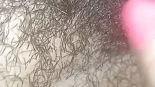 Desi amateur Indian horny and alone at home rubs her hairy bush