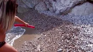 Stunning looking French ladies sharing a dick on a beach