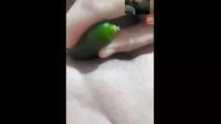 My lover inserts a small cucumber into her big pussy