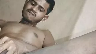Indian boy flashing his big cock in front of camera