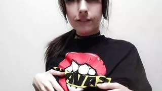 Bratty Goth girl teases by playing with tits