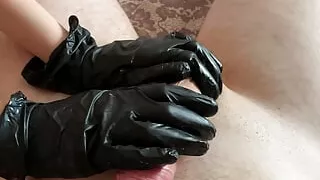 Sexy handjob with oil in black gloves