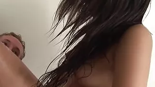 White guy thoroughly enjoys the soapy Asian massage and pummeling the perfect brunette from behind