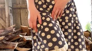 Village college girl having fun in front of the barn